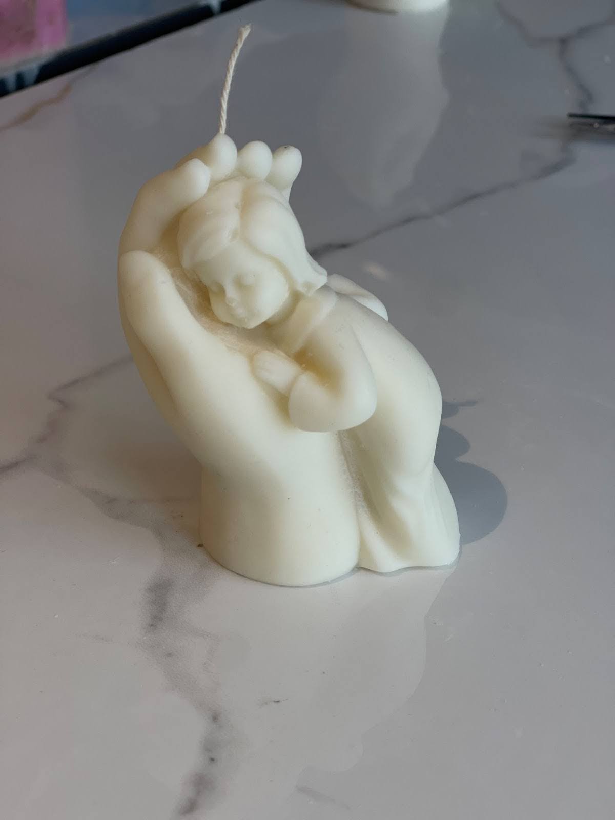 Child in Hand Candle